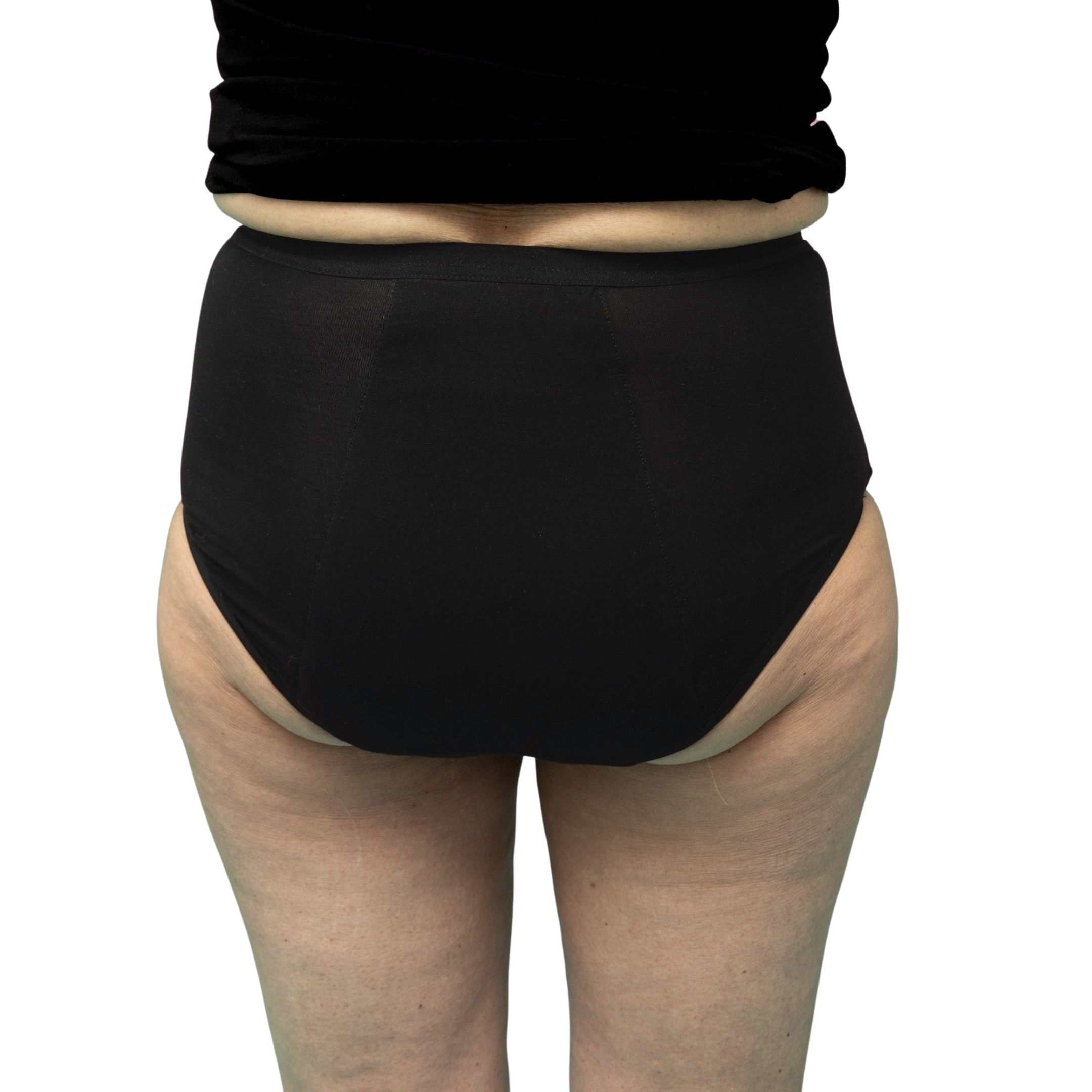 Rückansicht einer Frau in schwarzer, ultra-absorbierender Inkontinenz-Hose. Die Hose bedeckt den Po und die Hüften.