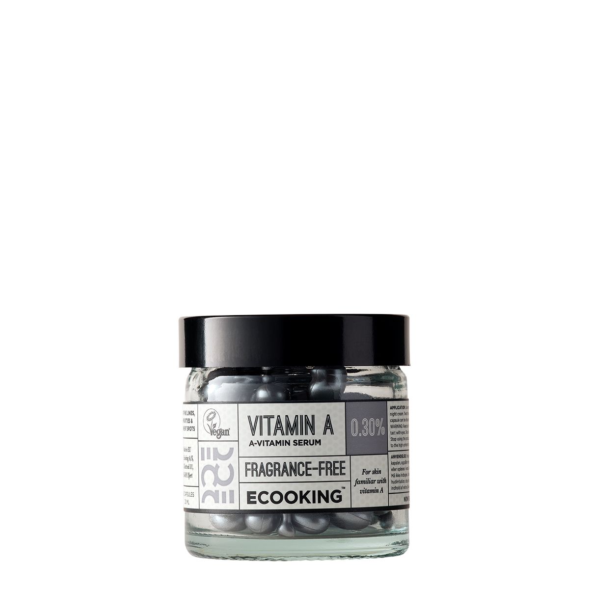 Glas mit Kapseln. Aufschrift: Vitamin A 0,30%, Fragrance-Free, Ecooking. Vegan-Siegel.
