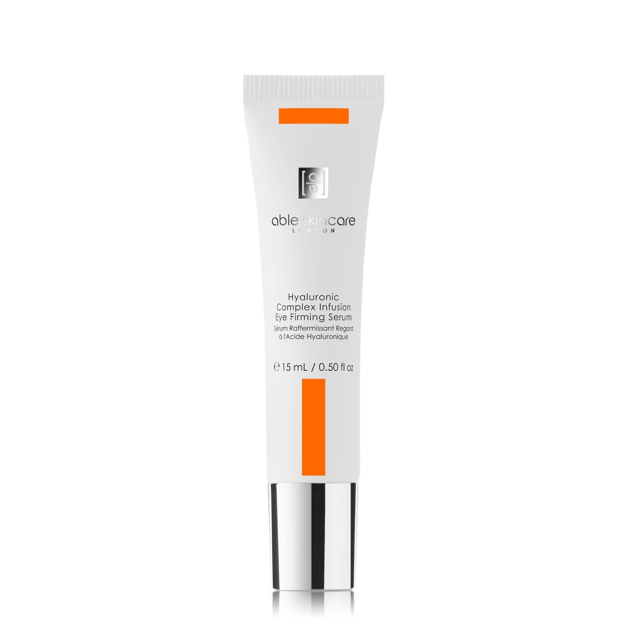 Weiße Tube mit orangefarbenen Akzenten und silberfarbenem Verschluss. Beschriftung: Hyaluronic Complex Infusion Eye Firming Serum. 15 ml.