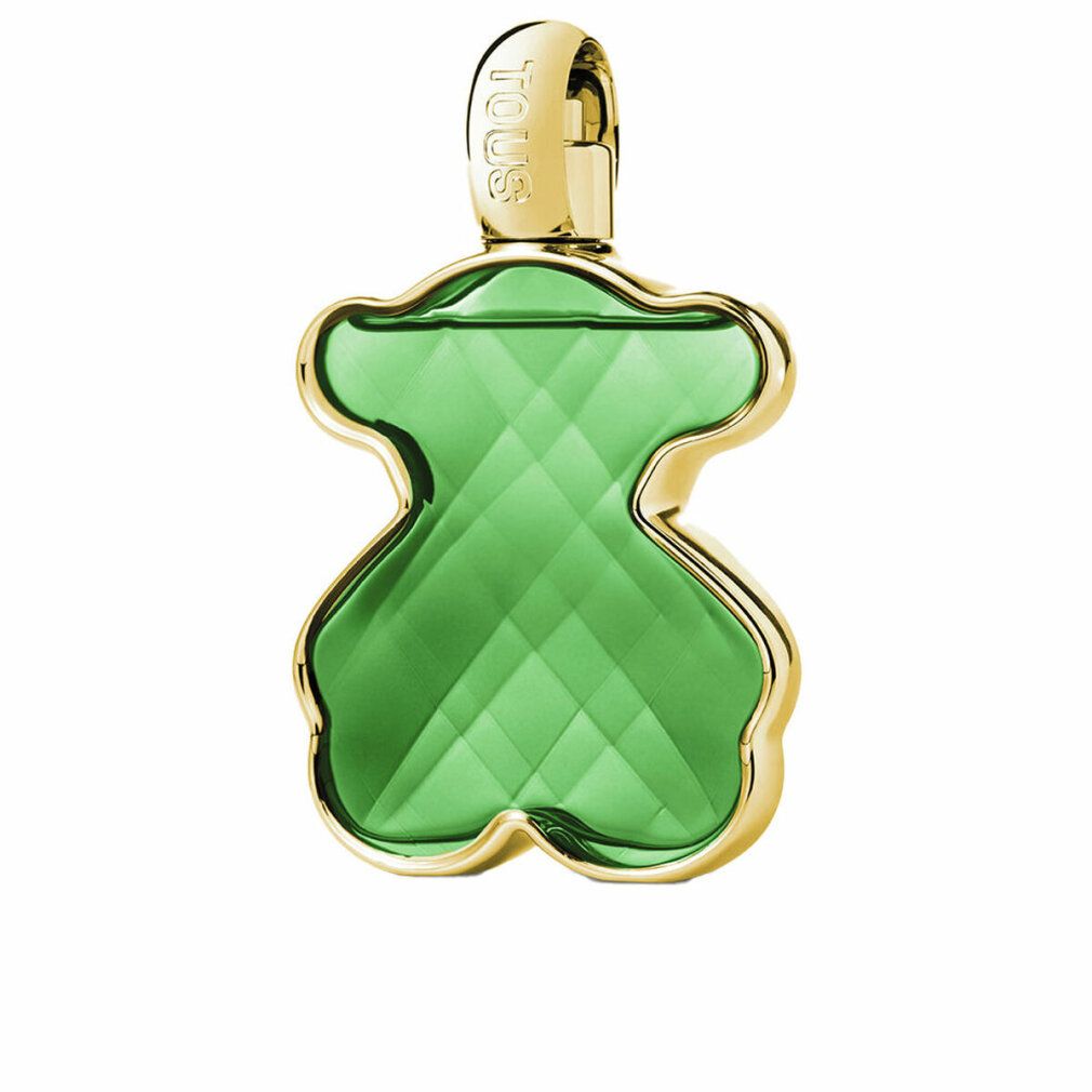 Grüner Flakon in Bärenform mit goldfarbenem Verschluss. Der Flakon hat eine facettierte Oberfläche. Der Markenname ist auf dem Verschluss sichtbar.