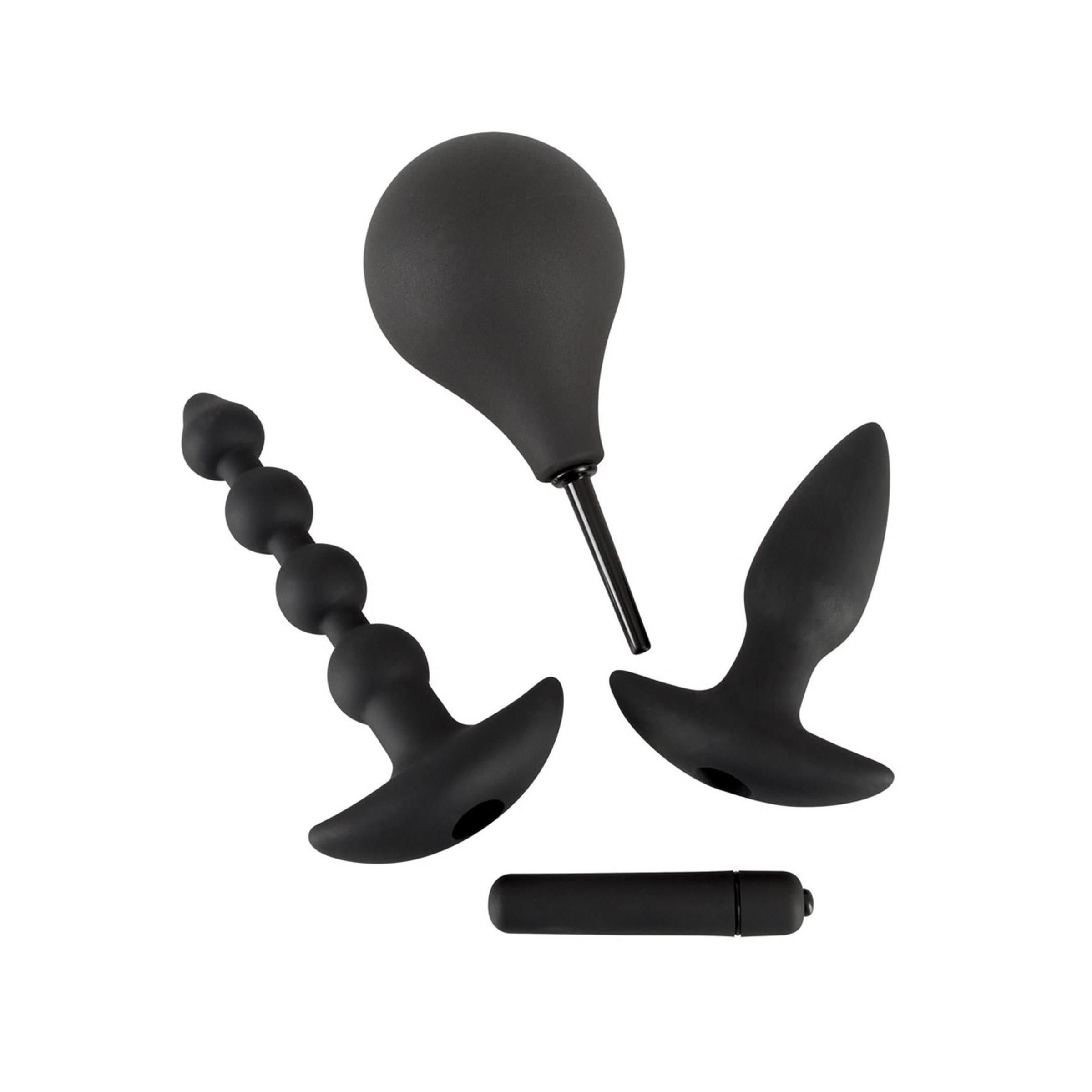 Schwarzes Anal-Kit. Enthält Douche, Perlen, Plug und Vibrationskugel. Einzelteile aus Silikon.