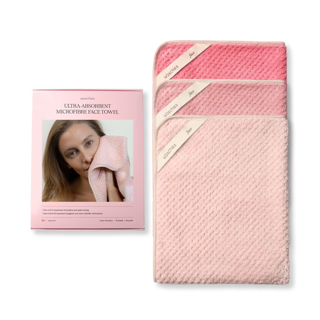 Verpackung mit drei Mikrofasertüchern in Rosa. Box zeigt Frau mit Tuch. Tücher mit Etikett.