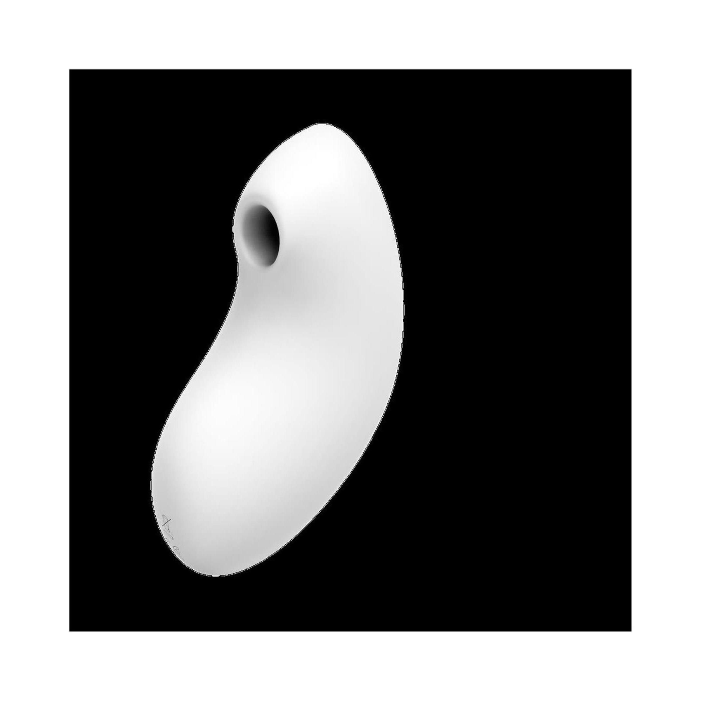 Weißes, ovales Gerät mit Loch. Schwarzer Hintergrund.