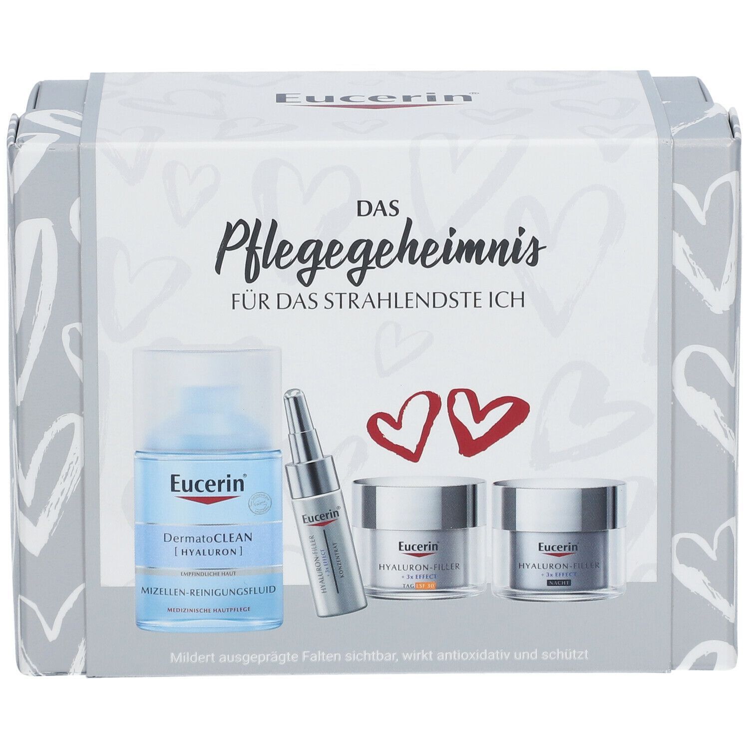 Geschenkset mit Gesichtspflegeprodukten. Enthält Reinigungsflüssigkeit, Serum und Cremes. Eucerin Logo und Produktnamen sichtbar.