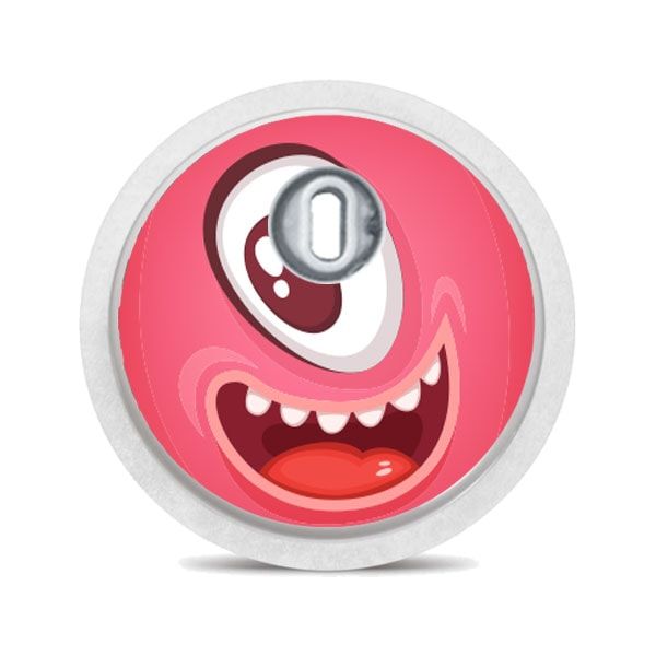 Runder Aufkleber mit rotem Monstergesicht. Großer Mund, Zähne, Auge. Mit silbernem Applikator.