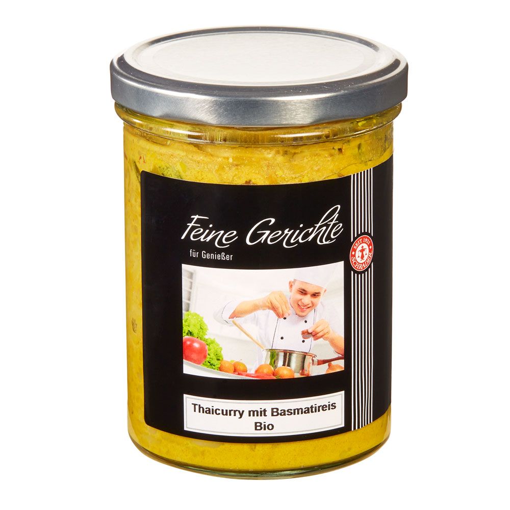 Glas mit Thai Curry und Basmatireis. Schwarzes Etikett mit Koch und Text. Bio-Siegel.