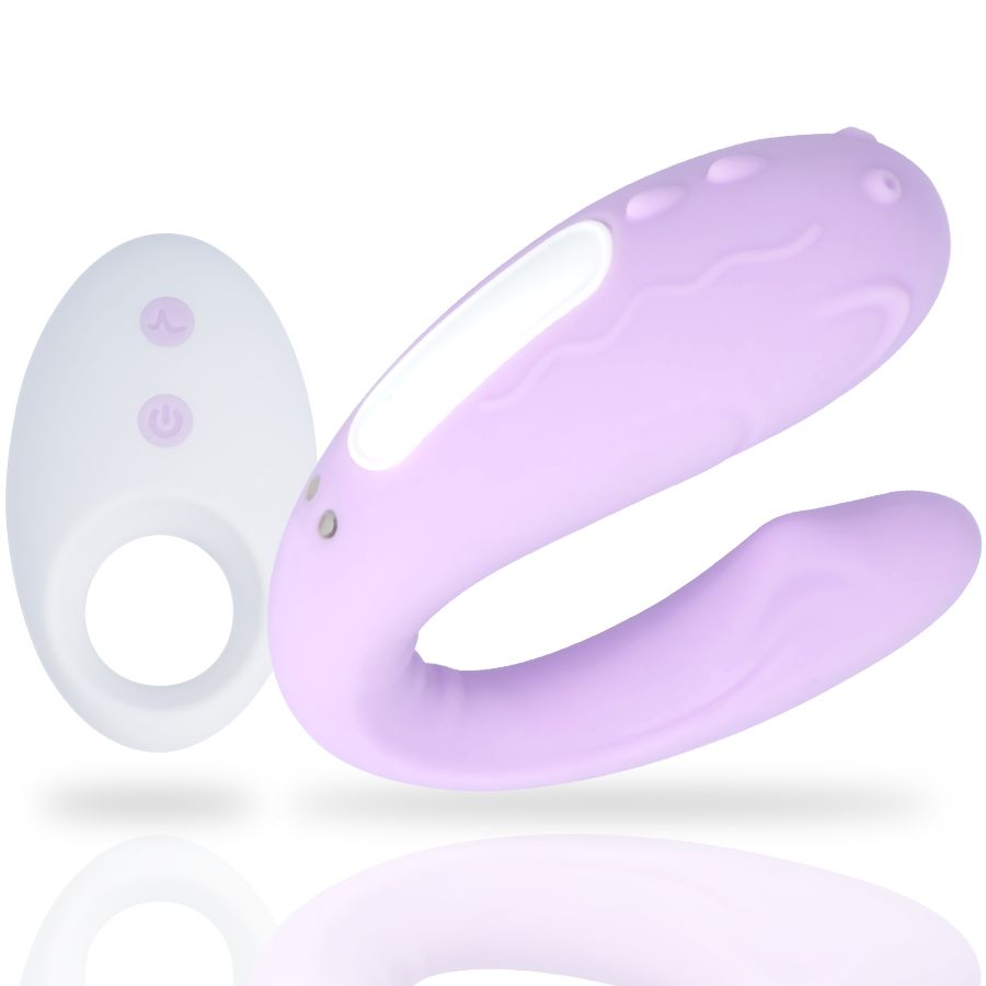 Lila Vibrator und weißer Ring-Fernbedienung. Vibrator mit wellenförmigen Details und weißem Bereich. Zwei Knöpfe.