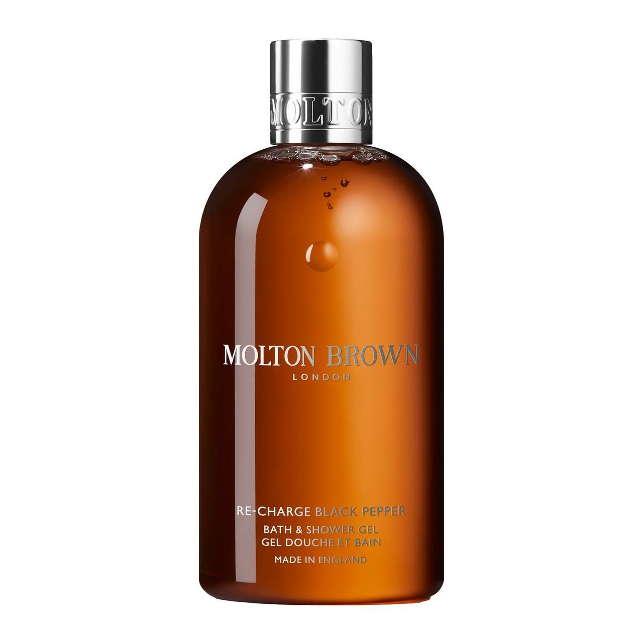 Braune Flasche mit silbernem Deckel. Aufschrift: Molton Brown London, Re-Charge Black Pepper, Bade- & Duschgel. Hergestellt in England.