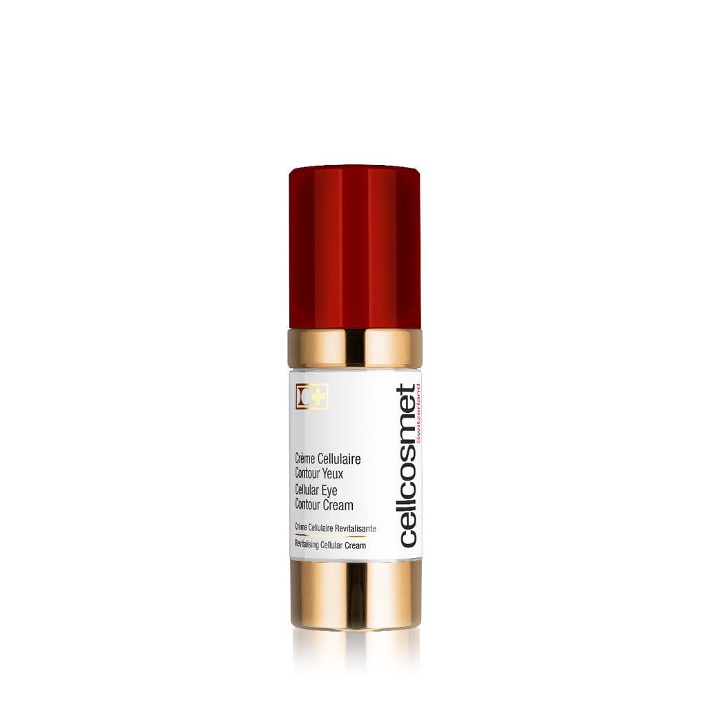 Zylinderförmige Flasche mit rotem Deckel und goldenen Akzenten. Aufschrift: Cellcosmet, Crème Cellulaire Contour Yeux, Cellular Eye Contour Cream.