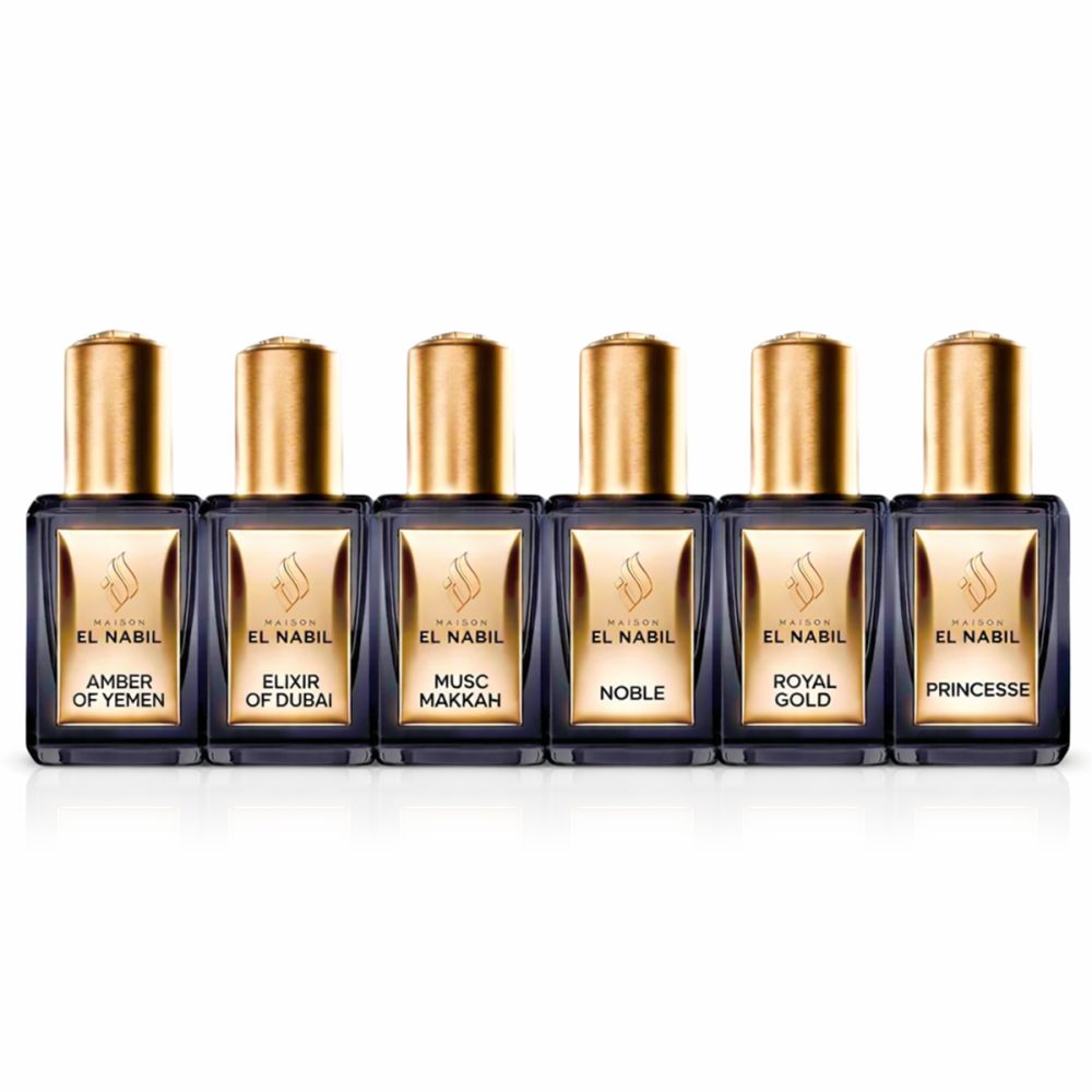 Sechs Flakons mit goldenen Kappen. Aufschrift: El Nabil, Amber of Yemen, Elixir of Dubai, Musk Makkah, Noble, Royal Gold, Princesse.