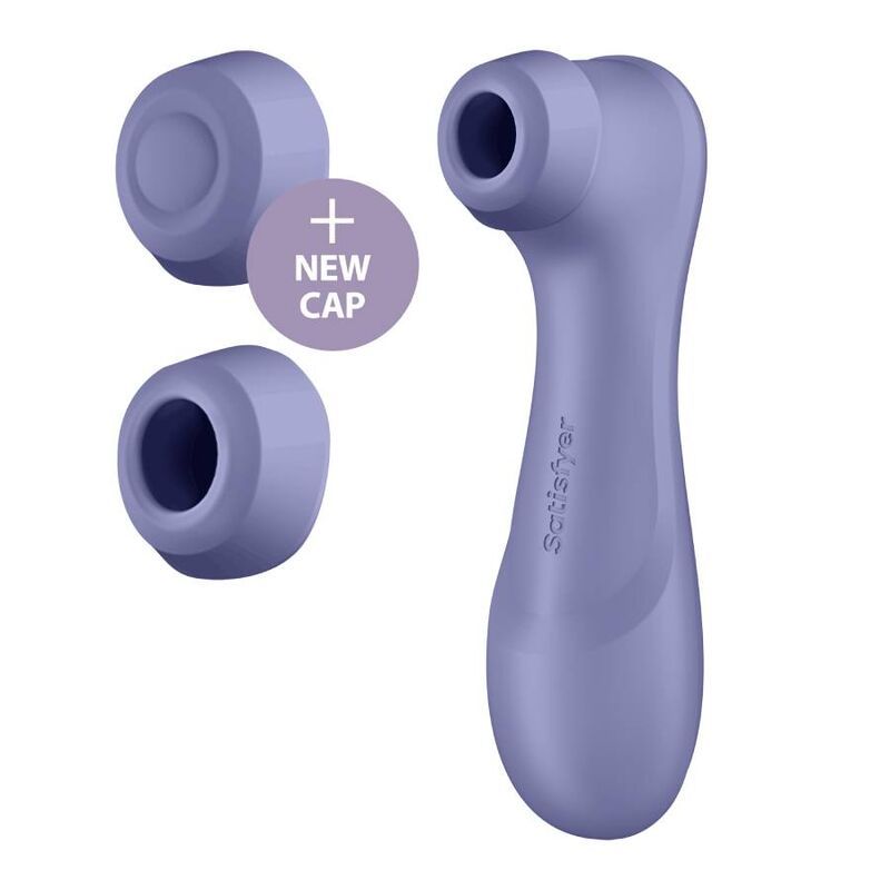 Lila Vibrator mit zwei Aufsätzen. Ein Aufsatz ist mit 'NEW CAP' gekennzeichnet.