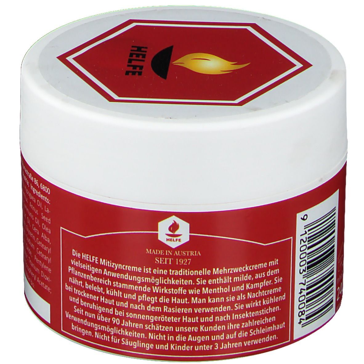 Creme-Dose mit rotem Etikett und weißem Deckel. Auf dem Deckel befindet sich ein rotes Sechseck mit einer Flamme und dem Wort HELFE.