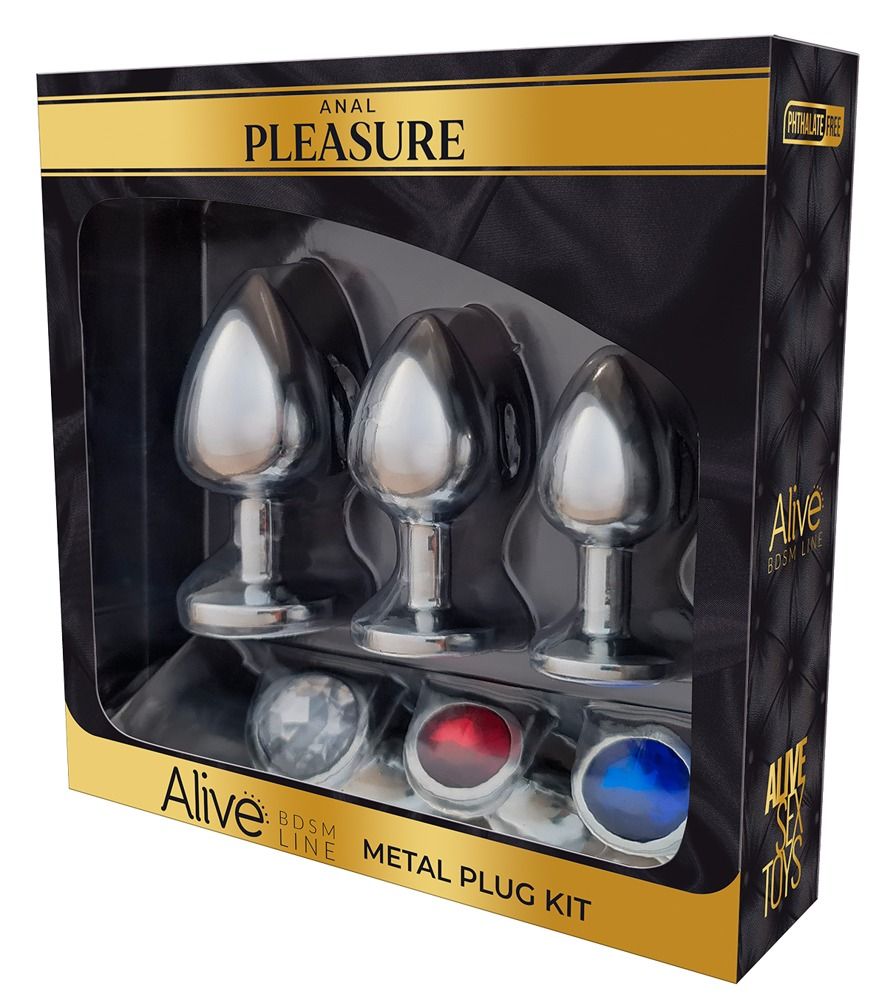 Verpackung mit drei Metall-Analplugs und farbigen Schmucksteinen. Schwarze Box, Produktname 'Alive'.