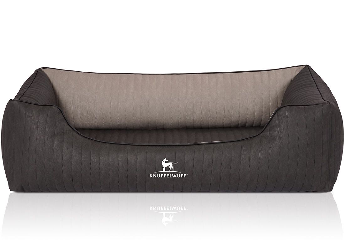 Orthopädisches Hundebett Outback, dunkelgrau mit beigem Innenraum. Logo Knuffelwuff. Rechteckige Form mit erhöhten Seiten.