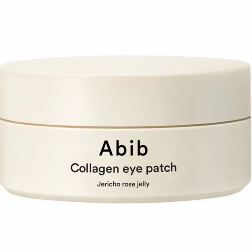 Beige Dose mit ABIB Kollagen-Augenpflastern. Aufschrift: Abib, Collagen eye patch, Jericho rose jelly.