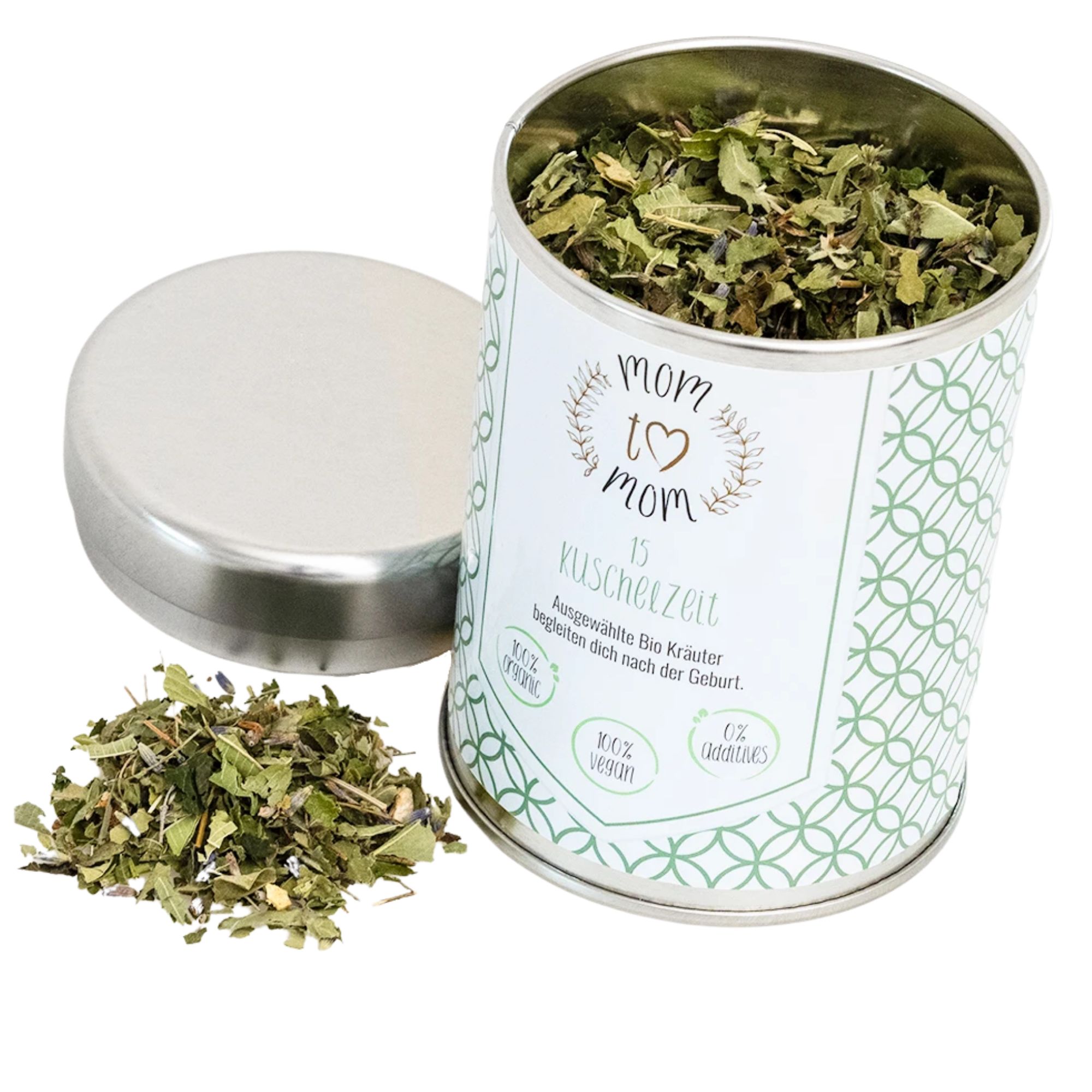 Metallbehälter mit Kräutermischung. Deckel daneben. Aufschrift: mom to mom Kuschelzeit, 100% vegan, Bio.