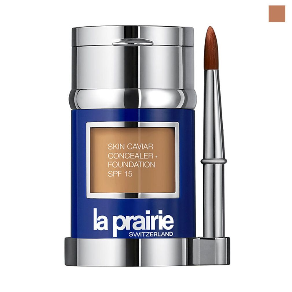 La Prairie Skin Caviar Foundation, Pinsel. Blau-silberne Tube mit Produkt und Pinsel. Produkt mit SPF 15.