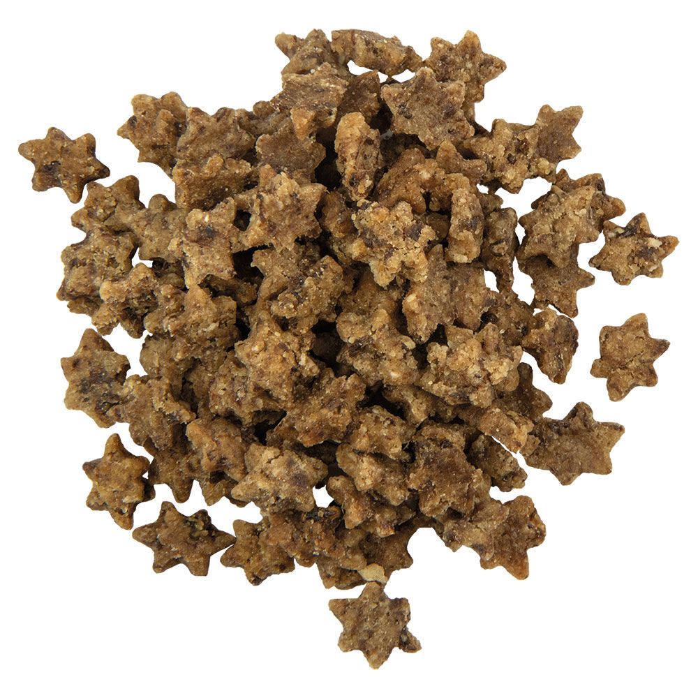 Haufen sternförmiger, brauner Kroketten. Getreidefreie Hundesnacks mit Putenleber.