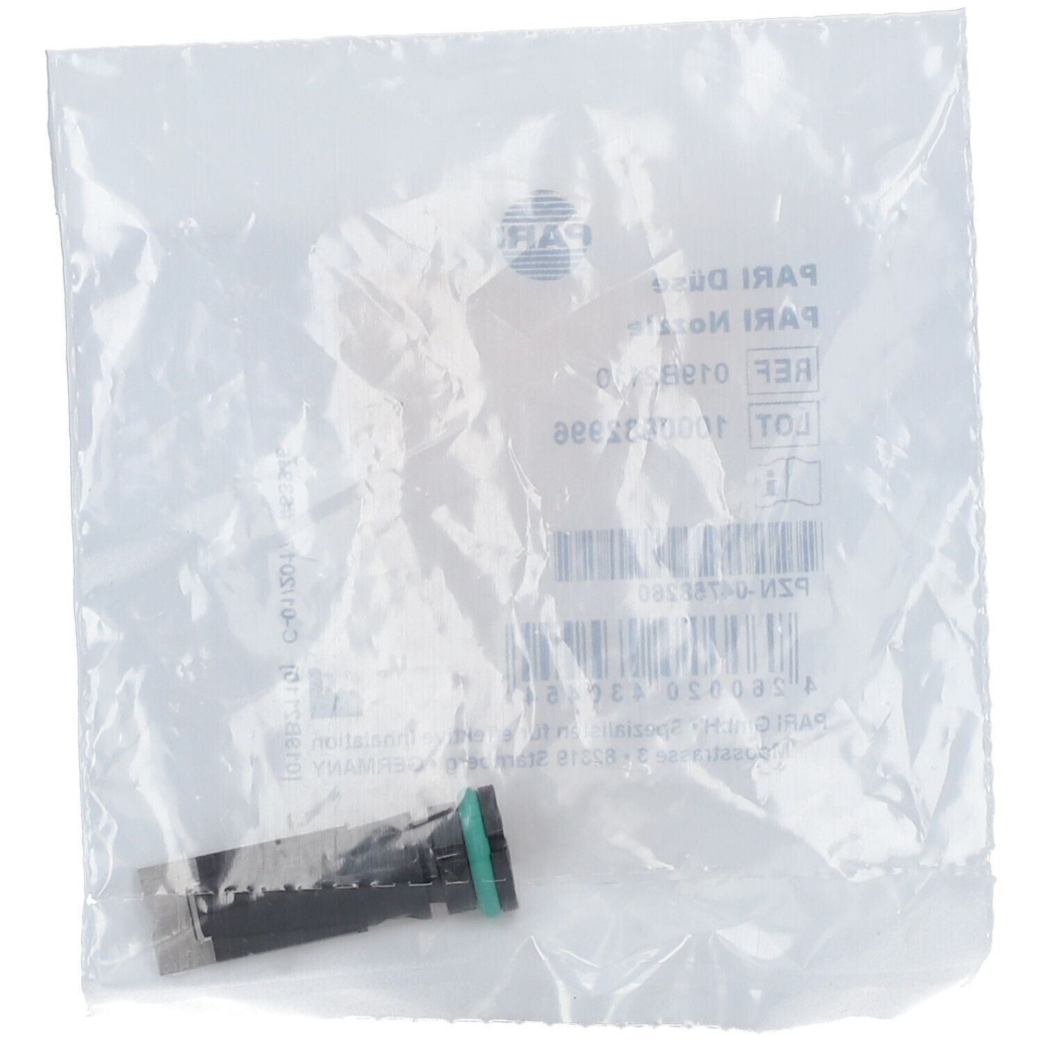 PARI Vernebler Düse in Plastikverpackung. Schwarzes Kunststoffteil mit grünem Ring. Verpackung mit Barcode und Text.
