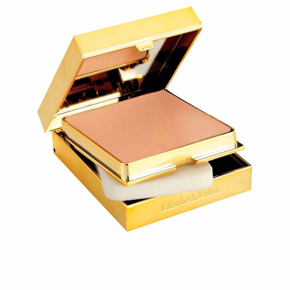 Goldfarbene Make-up-Kompaktverpackung mit Spiegel und Schwamm. Der Deckel ist geöffnet und zeigt einen hellen Puder.