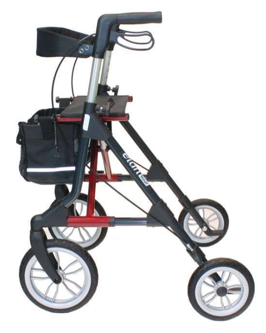 Rollator mit vier Rädern, rotem und schwarzem Rahmen. Schwarze Tasche und Sitz. Räder mit silbernen Felgen. Text 'elan tour'.