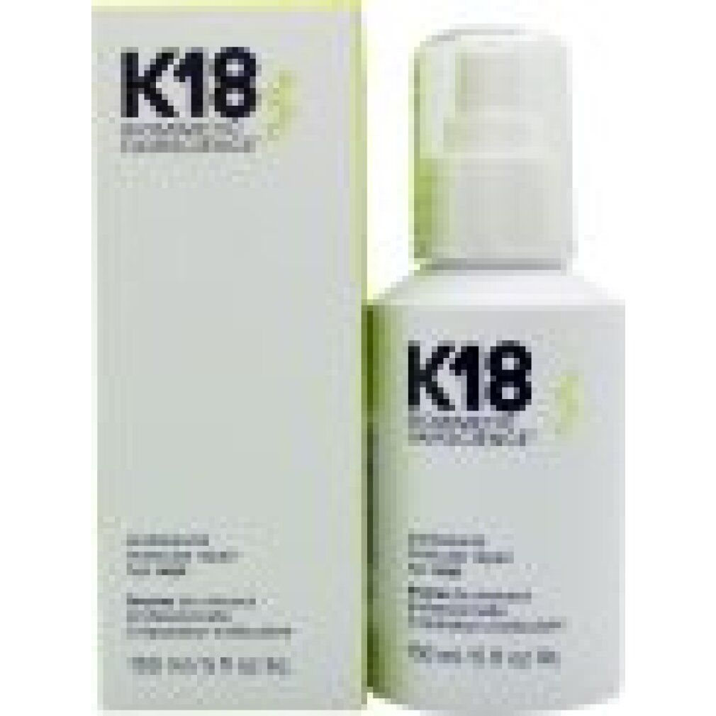 Produkt und Verpackung. Weiße Flasche mit Sprühkopf und Karton. Aufschrift: K18 BIOMIMETIC HAIRSCIENCE, 150 ml.