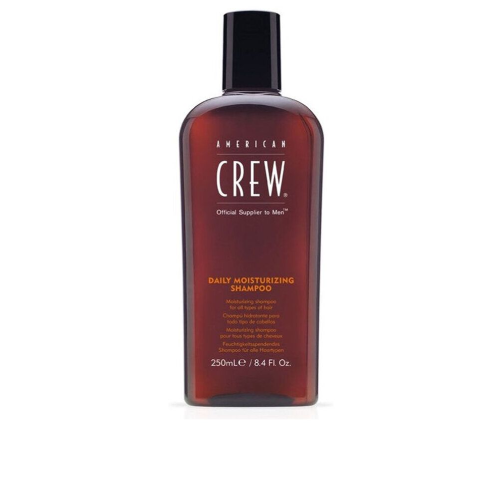 American Crew Daily Moisturizing Shampoo. Braune Flasche mit schwarzem Deckel. Produktbezeichnung und Logo auf der Vorderseite.