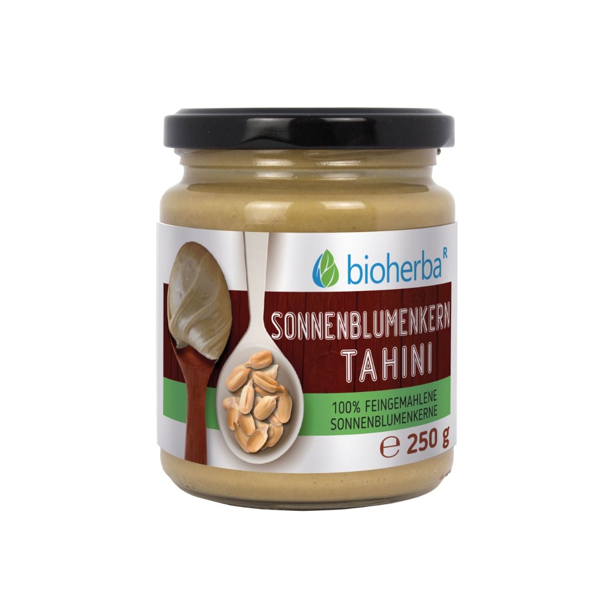 Glas mit Sonnenblumenkern Tahini. Schwarzer Deckel. Etikett mit Produktname, Logo und 250 g. Bioherba.
