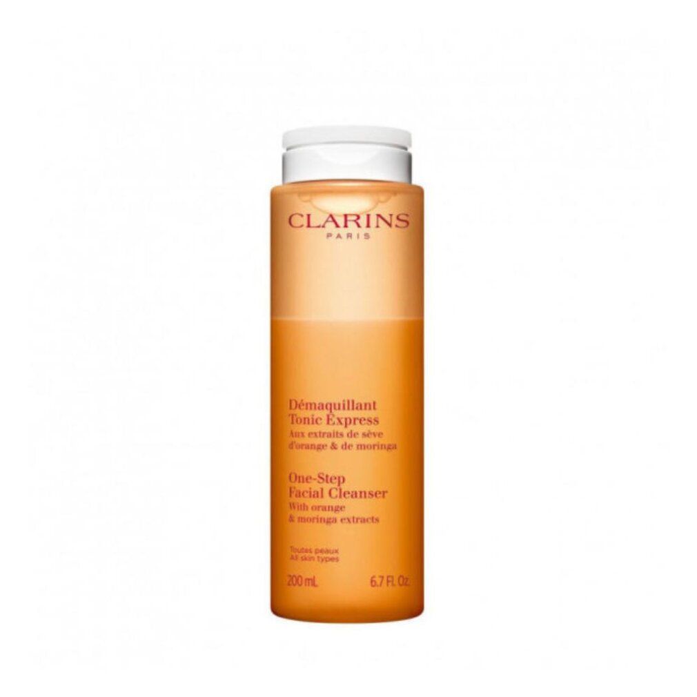 Clarins Tonic Express Flasche. Orangefarben, mit weißem Deckel. Text auf dem Etikett.