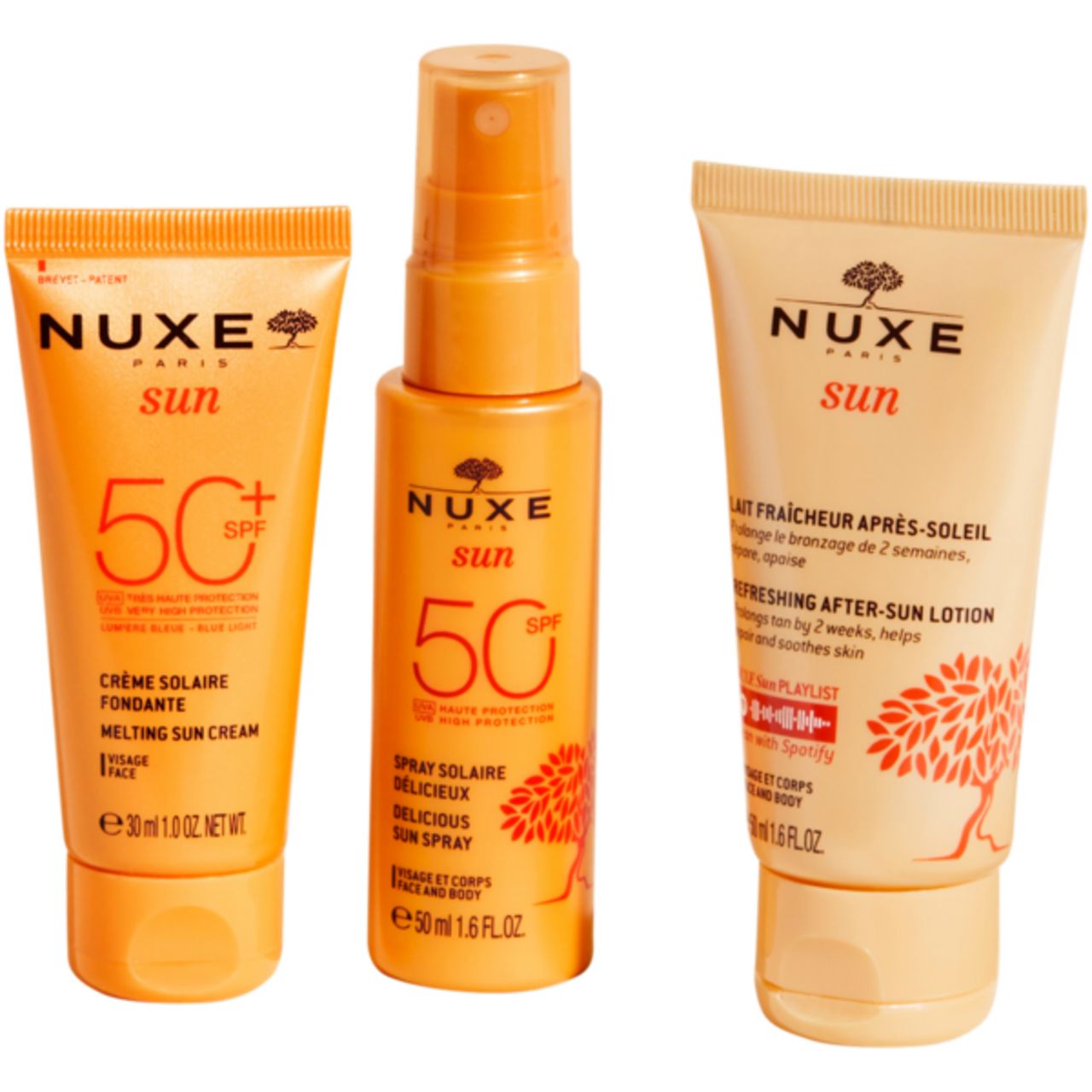 Drei NUXE Sun Sonnenpflegeprodukte. Enthalten Sonnencreme, Sonnenspray und After-Sun-Lotion.