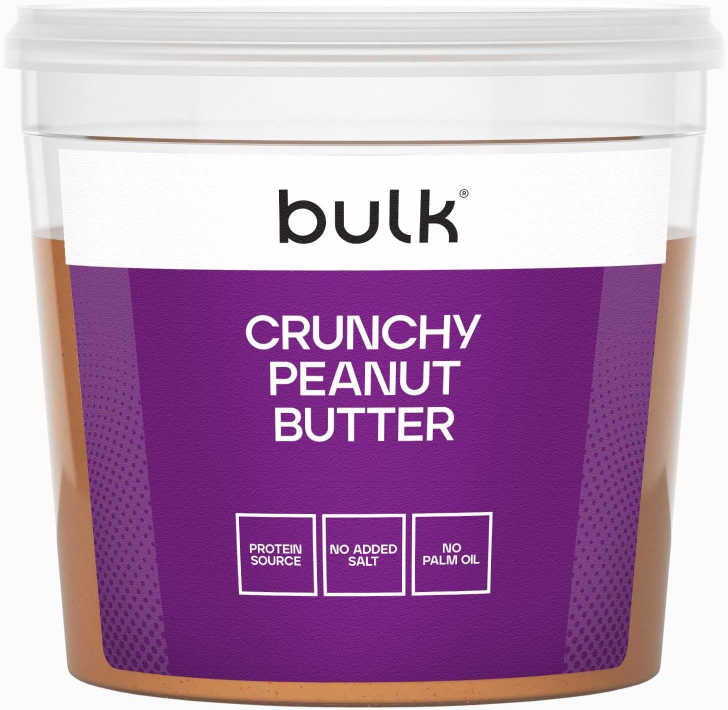 Behälter mit Crunchy Erdnussbutter. Lila Etikett mit "Crunchy Peanut Butter", "Protein Source", "No Added Salt", "No Palm Oil".