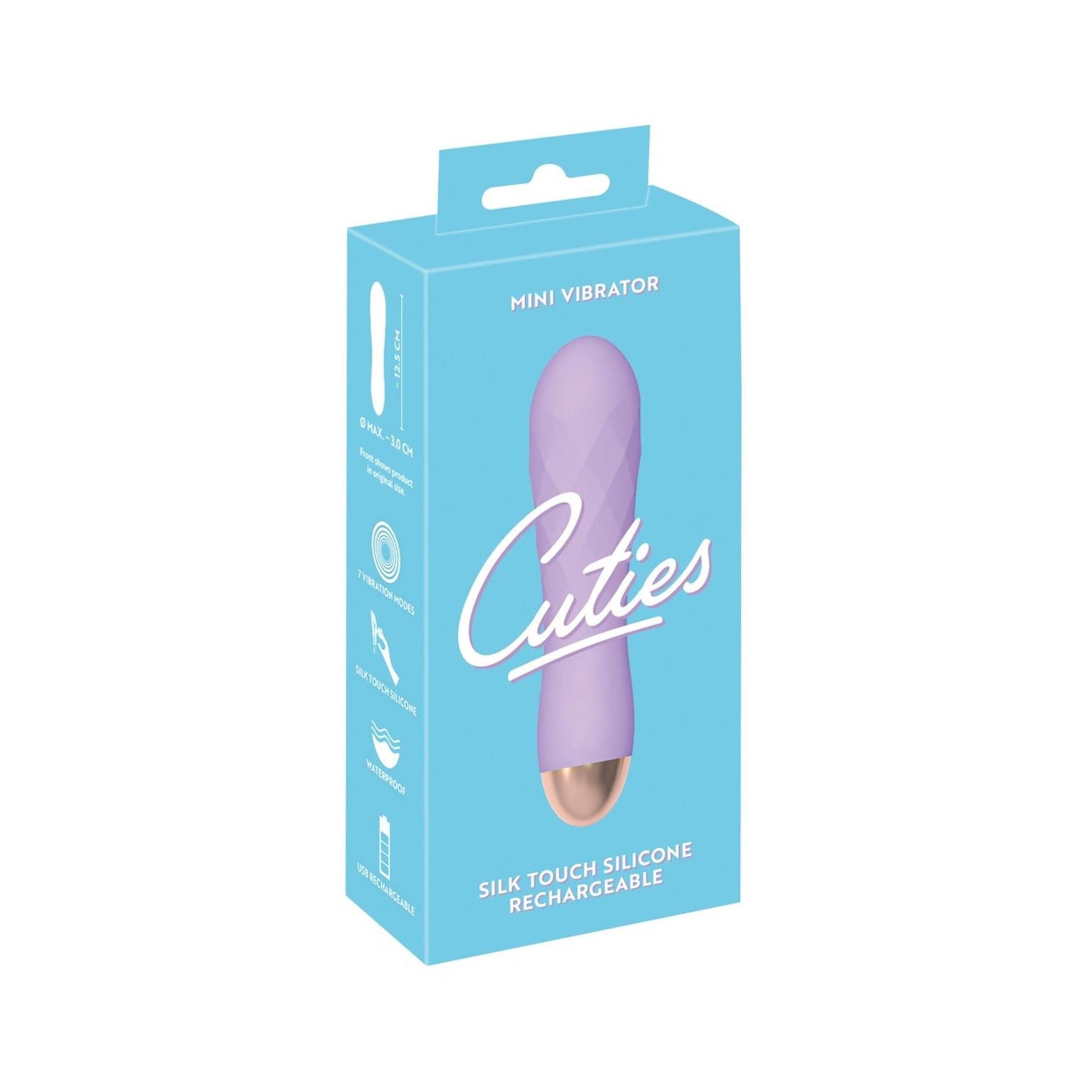 Hellblaue Verpackung mit Produkt: Cuties Mini Vibrator. Lila Vibrator abgebildet.