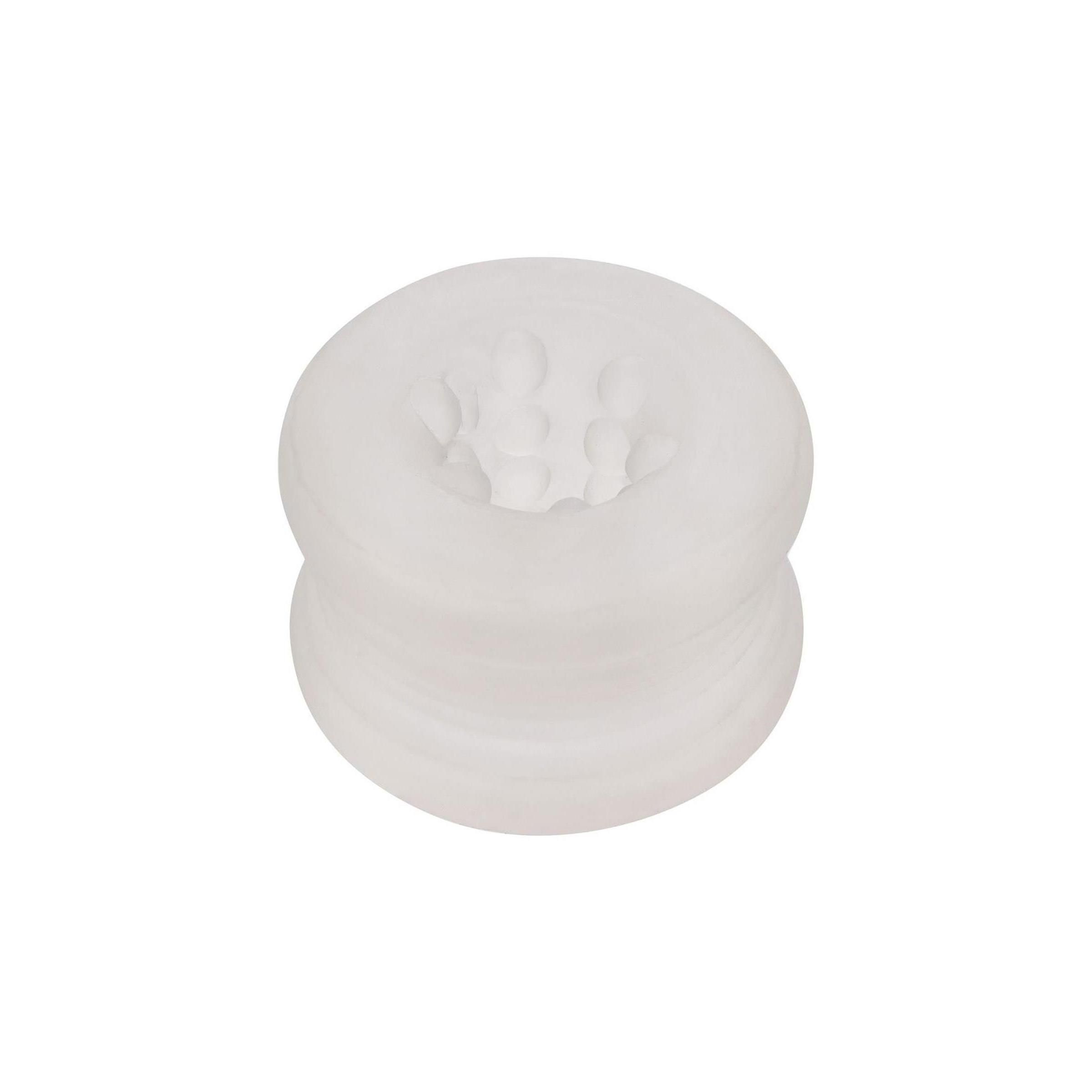 Ringförmiges Produkt aus durchscheinendem Material. Mit Öffnung und inneren Erhebungen. Für Intimbereich.