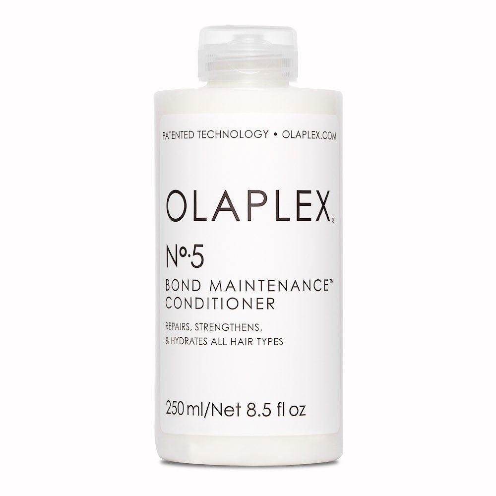 Weiße Flasche mit Etikett. Aufschrift: OLAPLEX No.5 Bond Maintenance Conditioner. 250ml/8.5 fl oz.