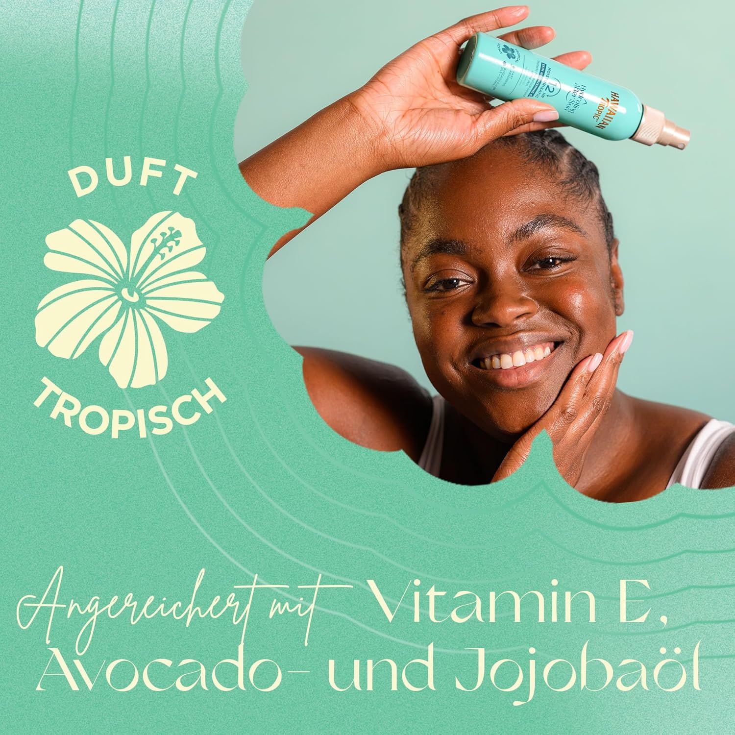 Frau lächelt, hält Sprühflasche. Text: Duft tropisch, Angereichert mit Vitamin E, Avocado- und Jojobaöl.