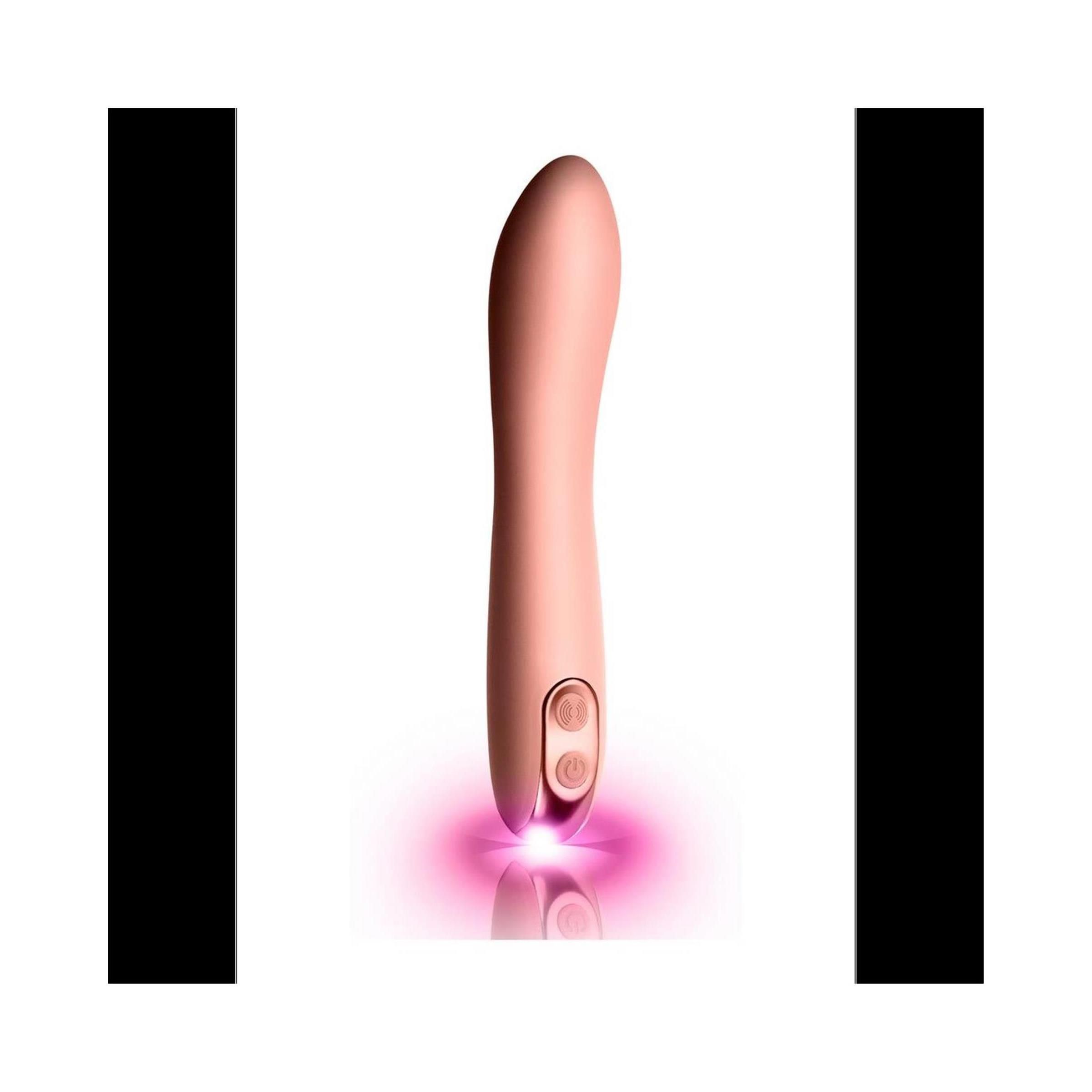 Rosa Vibrator mit zwei Knöpfen. Produkt mit abgerundeter Spitze. Beleuchtung unterhalb des Produkts.