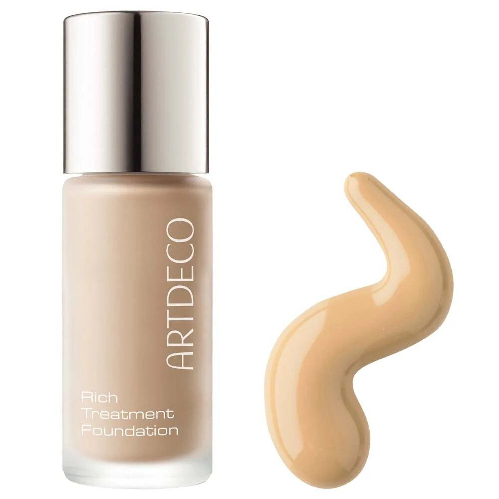Flakon Foundation und Klecks. Aufschrift: ARTDECO, Rich Treatment Foundation. Silberner Deckel.