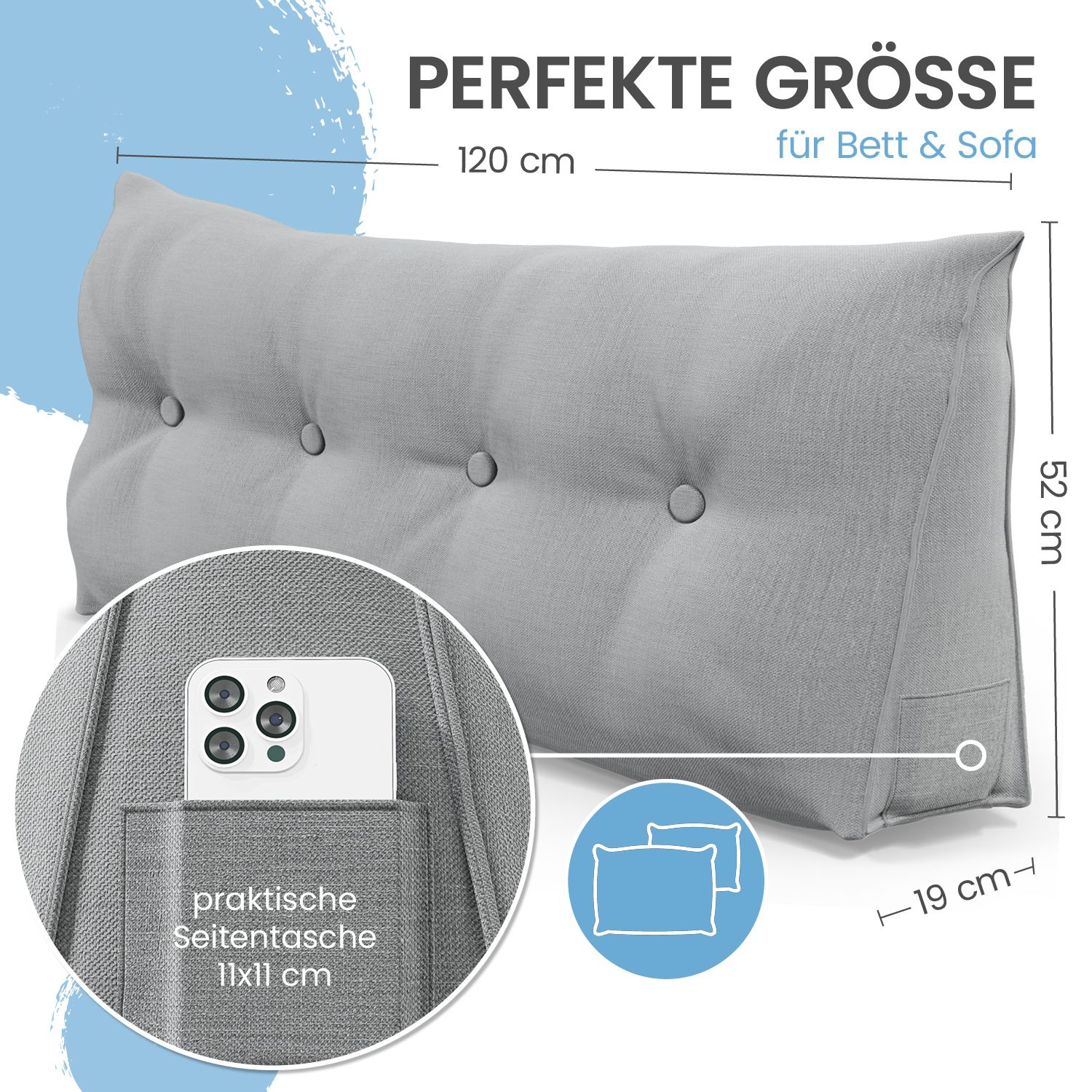 Graues Kissen mit Knöpfen. Maße: 120x52x19 cm. Smartphone in Seitentasche. Text: PERFEKTE GRÖSSE.