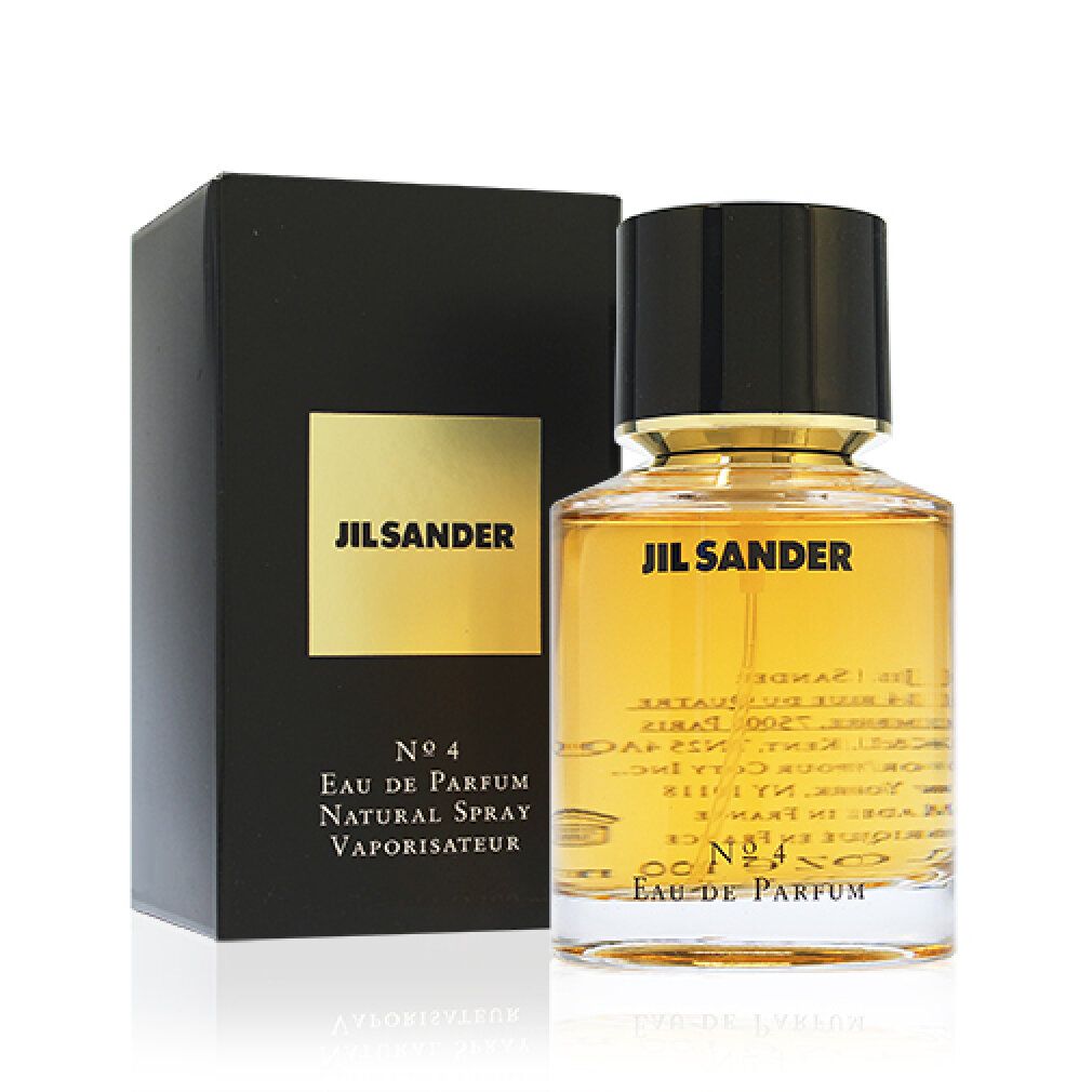 Jil Sander No 4 Eau de Parfum Flakon und Verpackung. Schwarzer Deckel, goldfarbener Hals, goldfarbene Flüssigkeit. Schwarze Verpackung.