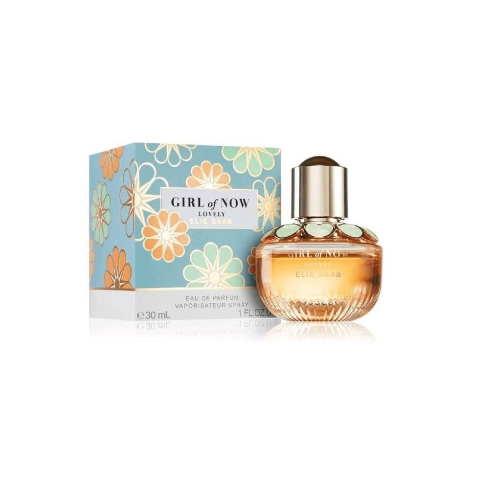 Parfümflasche und Schachtel. Flasche mit goldener Kappe, orangefarbener Flüssigkeit, grünen Blütenblättern. Schachtel mit Blumenmuster.
