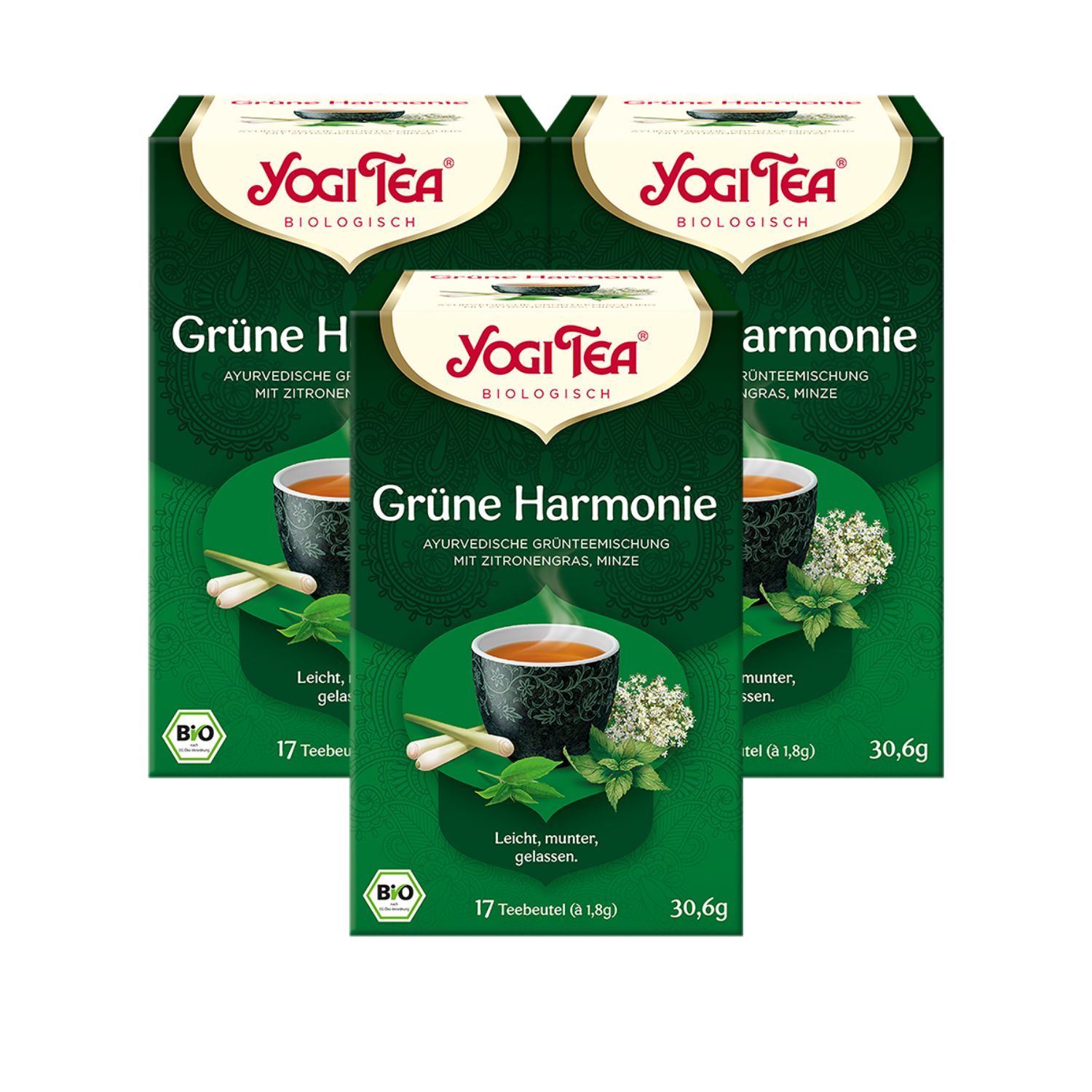 Drei grüne Yogi Tea-Schachteln. Aufdruck: "Grüne Harmonie", "Bio". 17 Teebeutel. Abbildung von Tee mit Zitronengras und Minze.