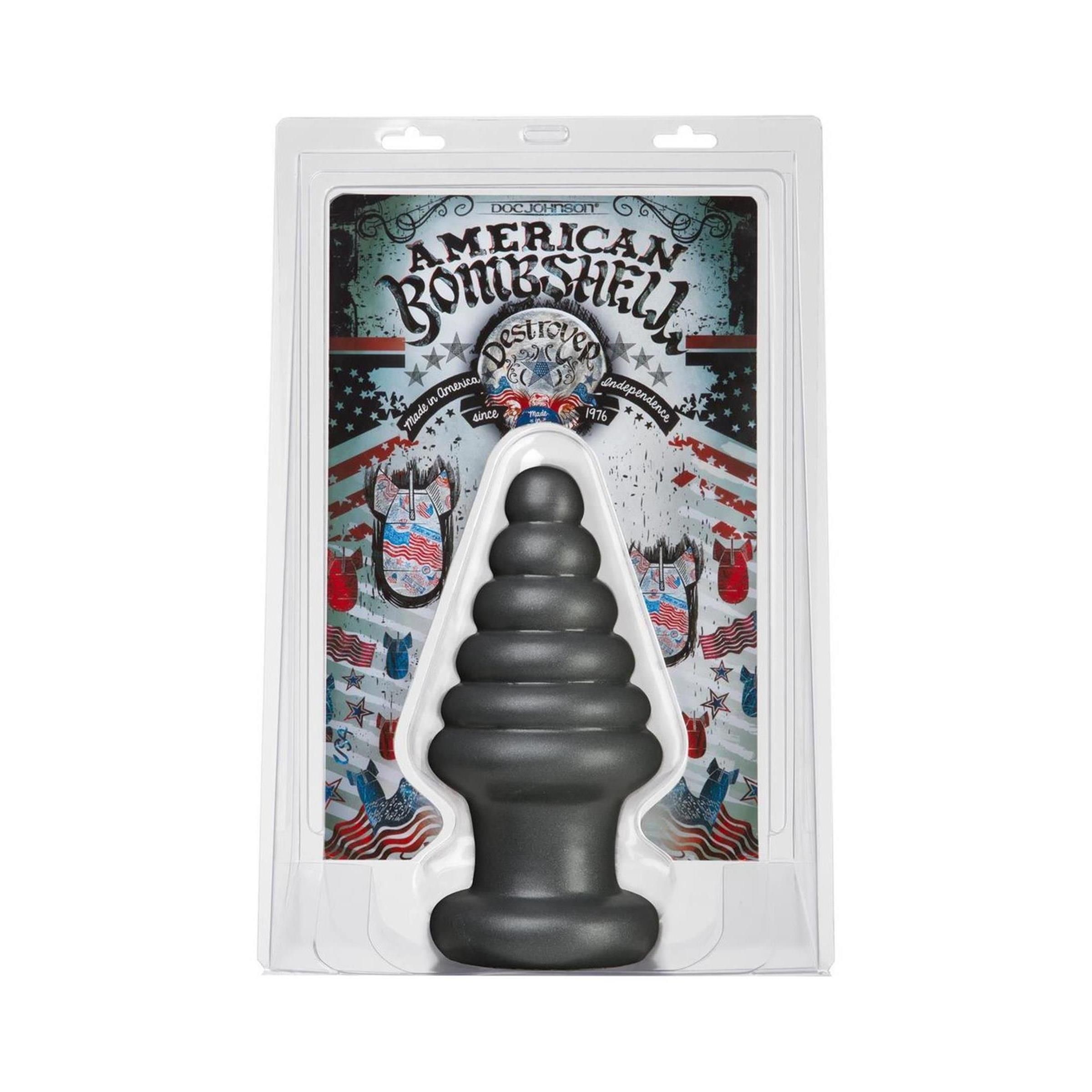 Schwarzer Analplug in Verpackung. Mehrteilige Form. Aufdruck "American Bombshell Destroyer".