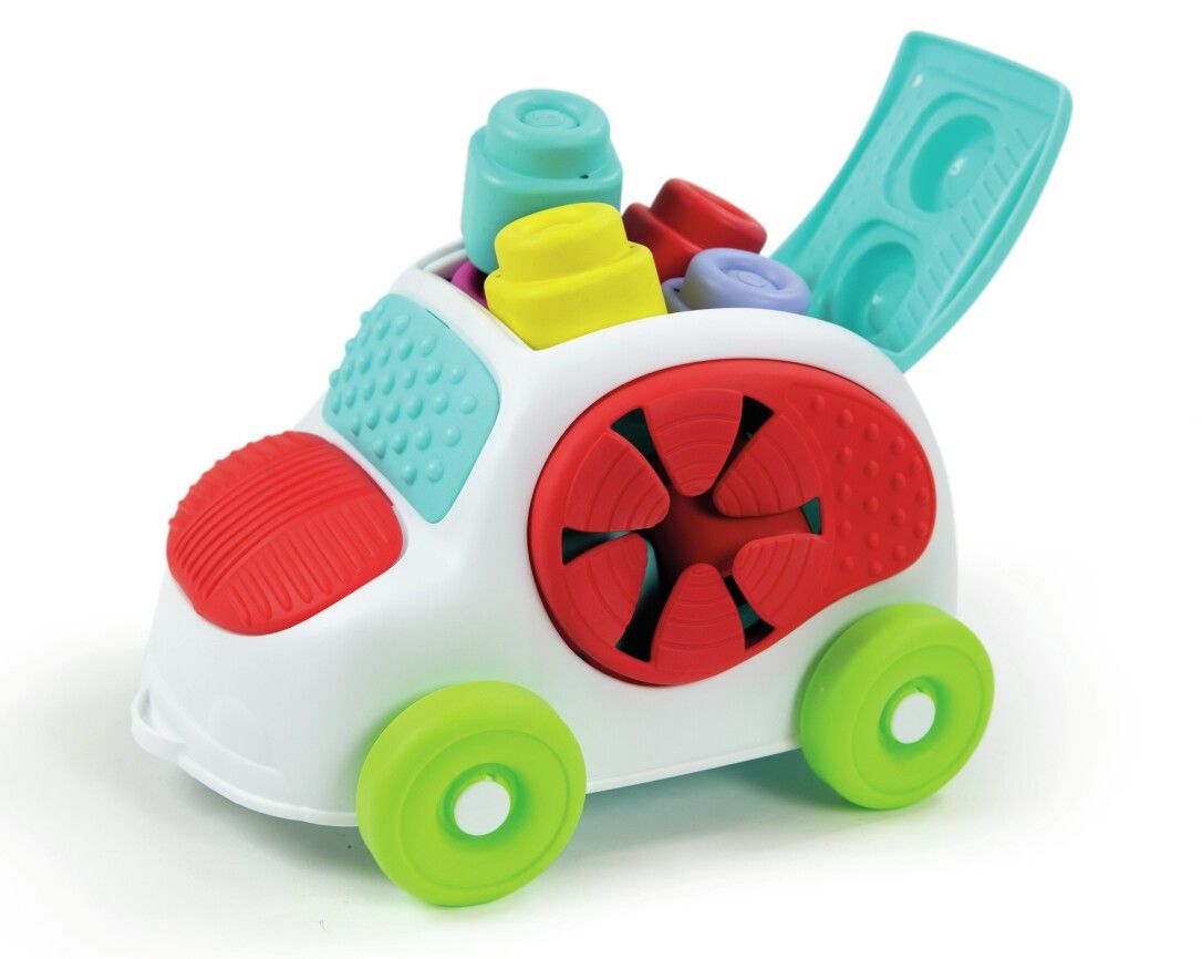 Weißes Spielzeugauto mit bunten Elementen und weichen Blöcken. Dach geöffnet.