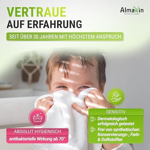 Kind hält ein weißes Handtuch vor dem Gesicht, daneben AlmaWin Werbung für Hygiene.