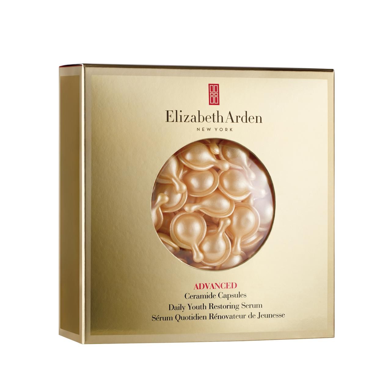Goldfarbene Verpackung mit Elizabeth Arden Logo. Sichtbar sind Kapseln im Inneren. Text: Ceramide Daily Youth Restoring Serum.