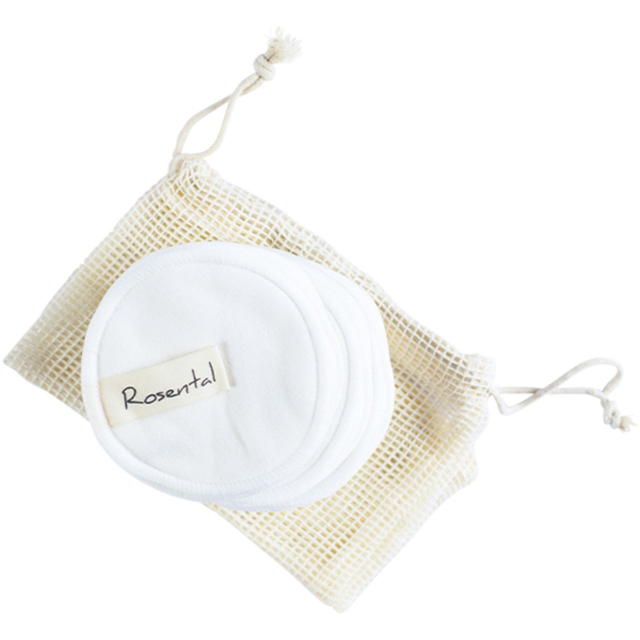 Rosental Reinigungspads in einem Netzbeutel. Runde, weiße Pads mit Etikett. Beutel aus hellem Stoff mit Kordelzug.