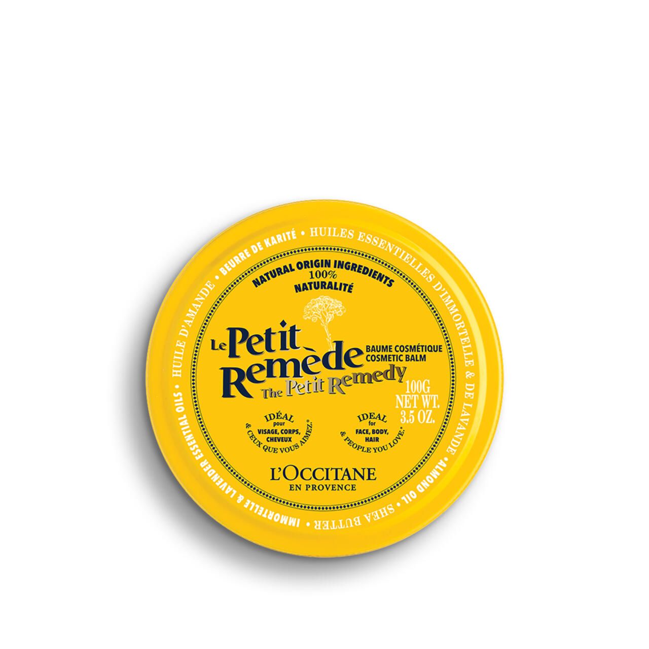 Gelbe Dose mit Aufschrift "Le Petit Remède". Text: "Baume cosmétique", "100% naturalité", "L'Occitane".