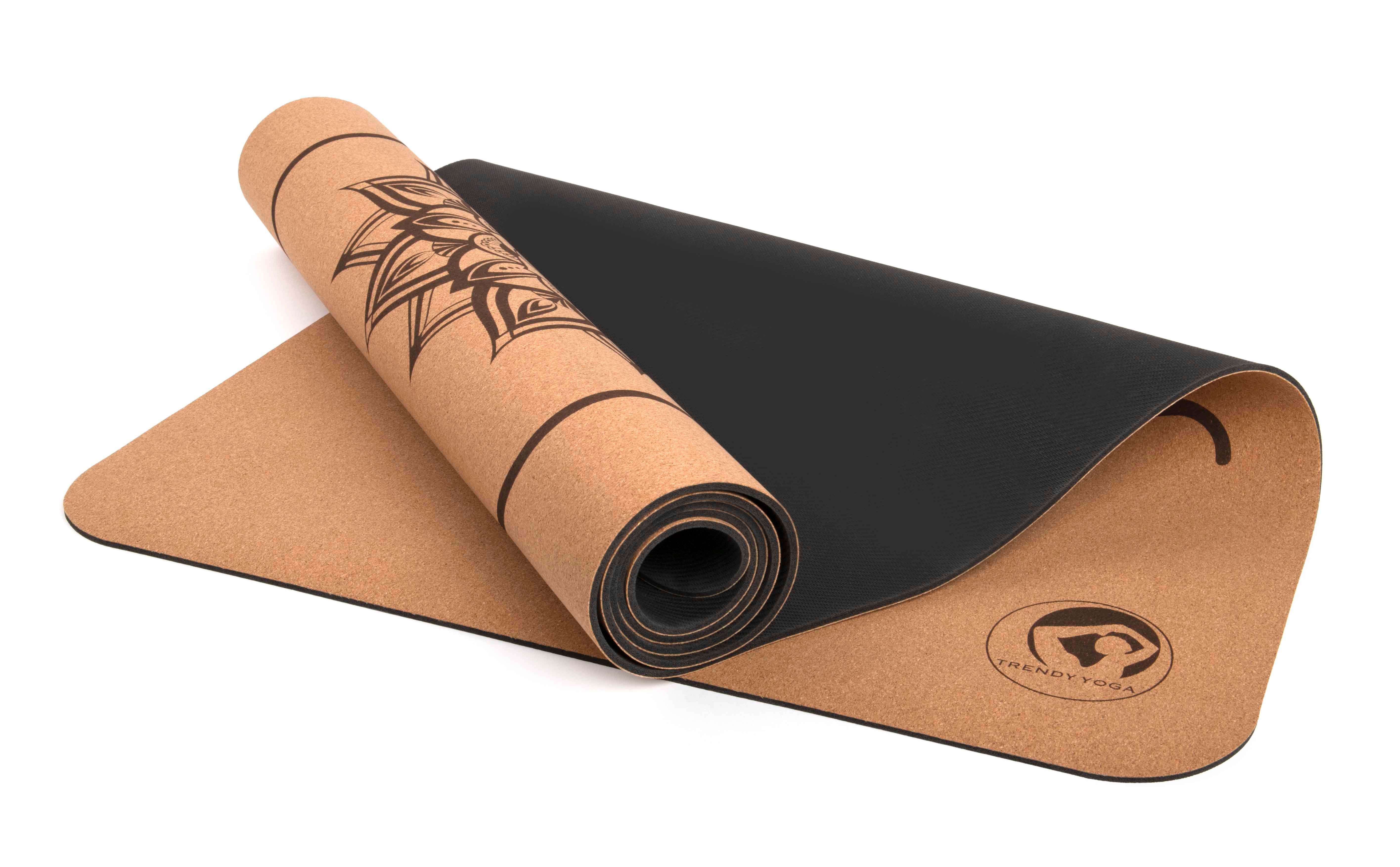 Yogamatte CORTICA, teilweise ausgerollt. Oberseite beige, Unterseite schwarz. Logo sichtbar.