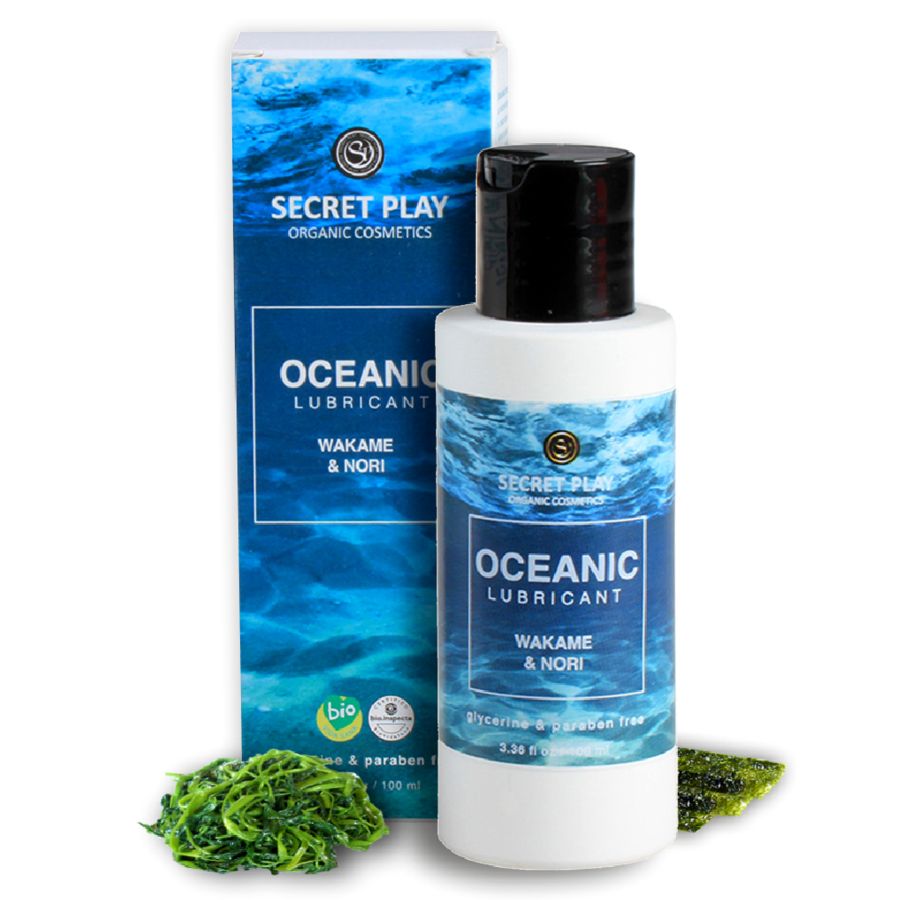 Flasche und Schachtel mit Produktname und Logo. Aufschrift: Oceanic Lubricant Wakame & Nori. Bio-Siegel. Algen daneben.
