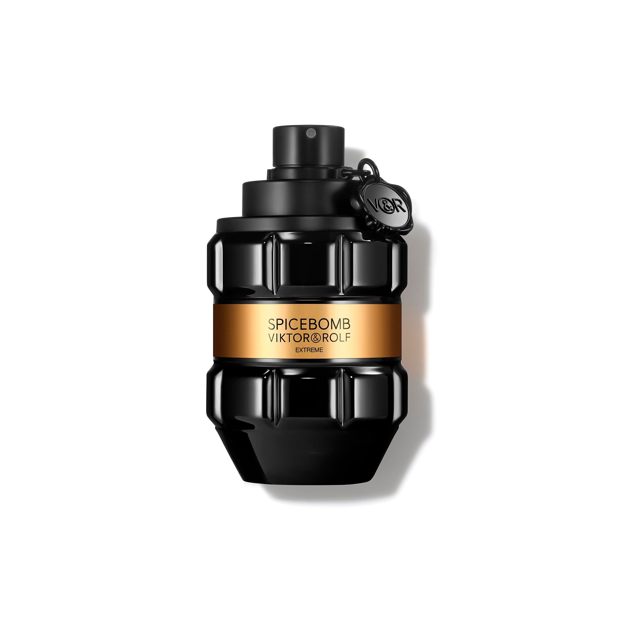 Schwarzer Flakon mit goldfarbenem Band. Aufschrift: SPICEBOMB VIKTOR&ROLF EXTREME. Schwarzer Verschluss mit Anhänger.